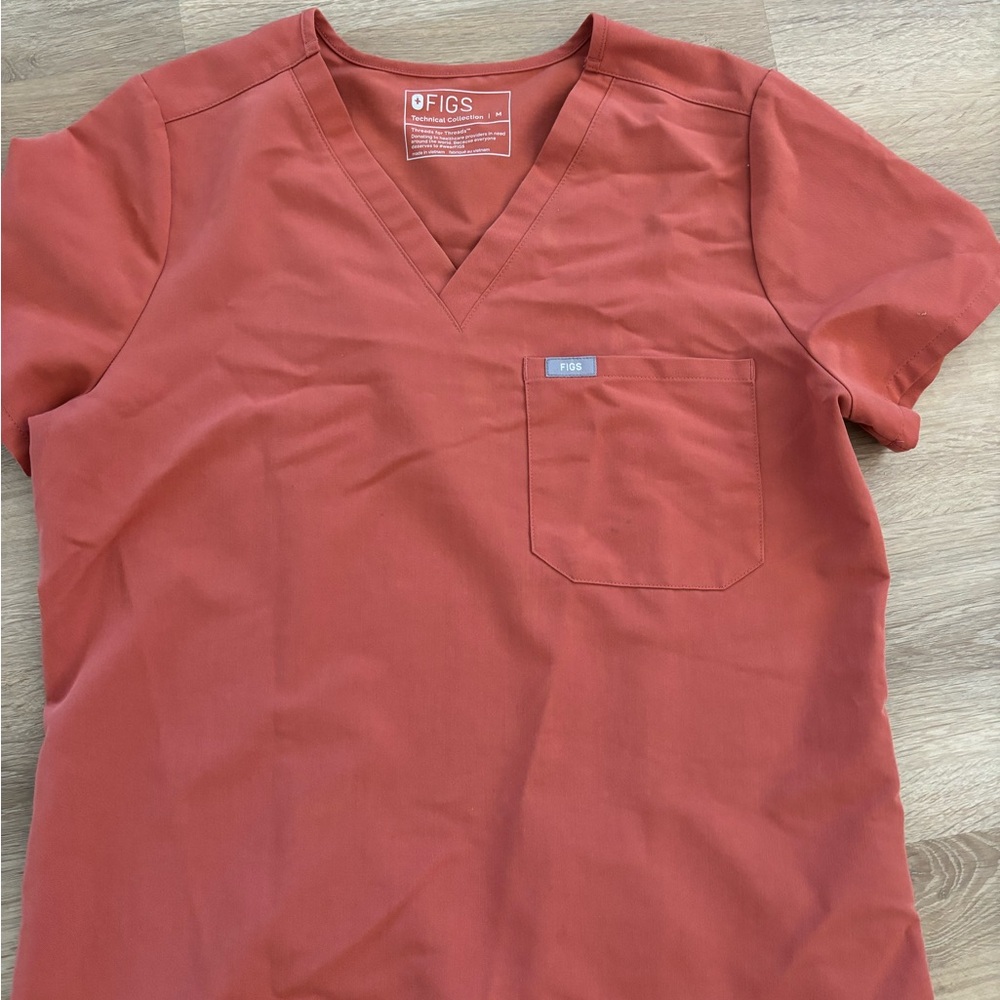 Orange tan scrub top and bottom